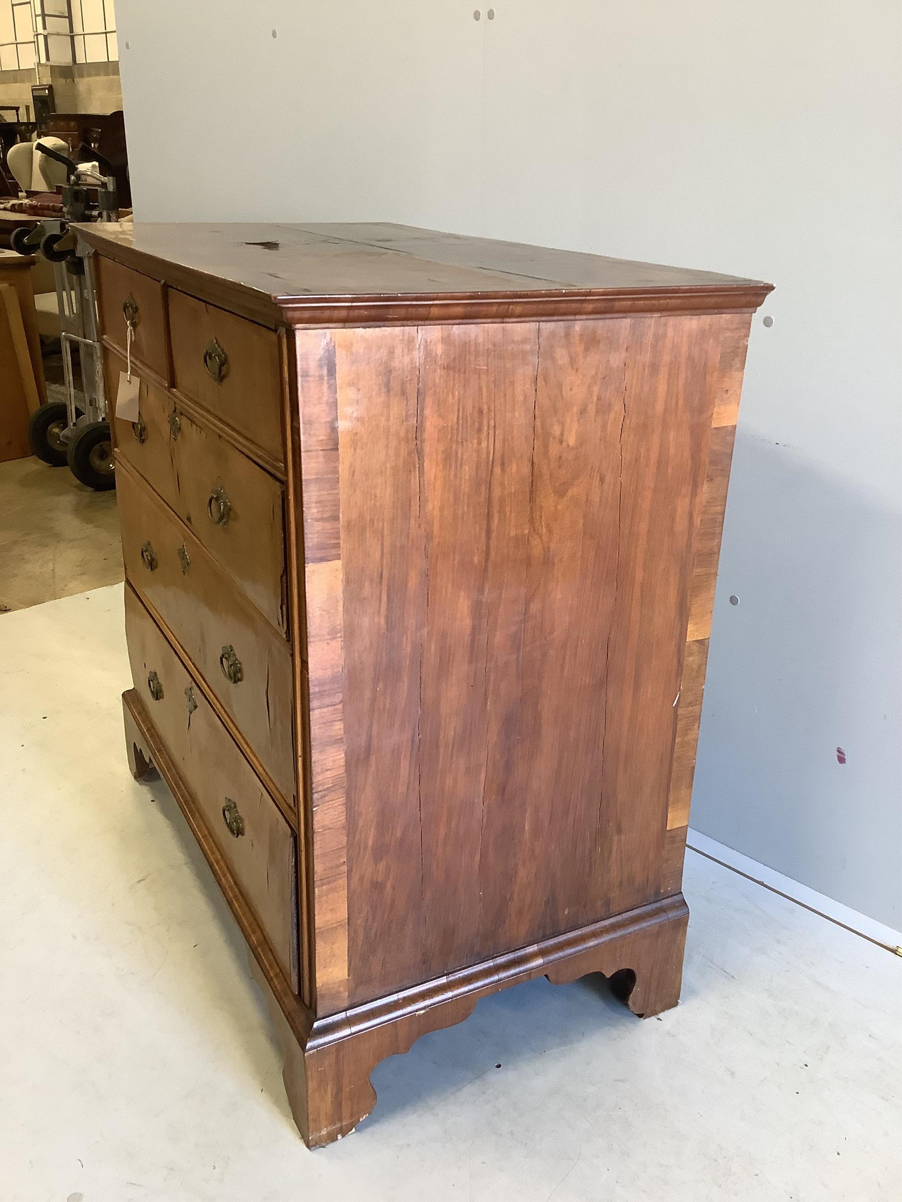 An 18th century and later banded walnut chest, width 101cm, depth 56cm, height 100cm. Condition - poor to fair